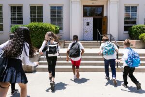 Family preparing for the new school year with a clean, organized home – back to school house cleaning checklist